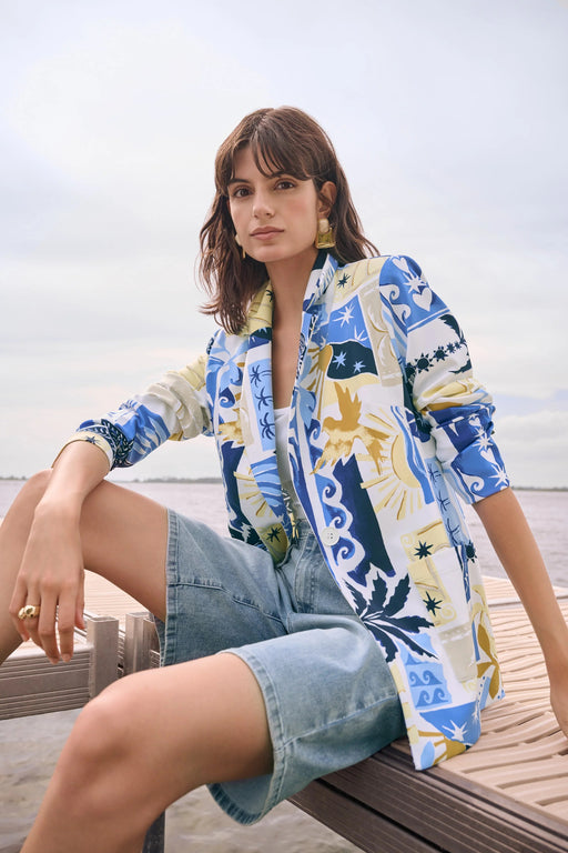 Woman wearing Joseph Ribkoff tropical print blazer for stylish office outfit