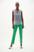 Woman wearing Joseph Ribkoff vanilla multi stripe sleeveless boxy blouse, featuring lightweight breathable fabric, relaxed fit, modern stripe design, and chic summer styling.