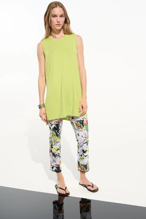 Woman wearing a colorful tropical and floral print crop pants with high waist from Joseph Ribkoff
