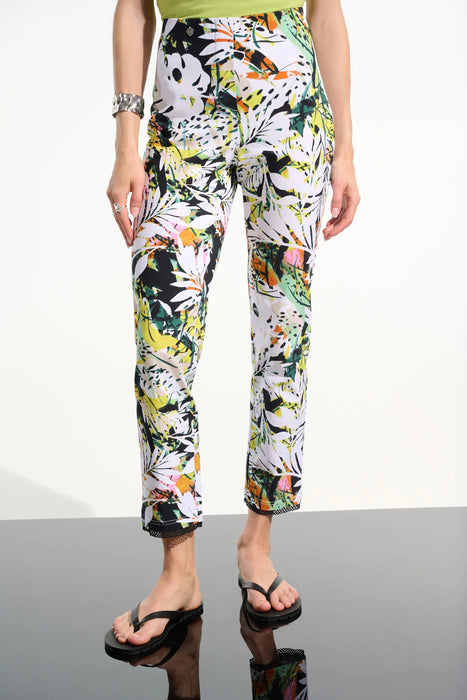 Woman wearing a colorful tropical and floral print crop pants with high waist from Joseph Ribkoff