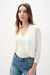 Woman modeling elegant open front knit cardigan with fitted silhouette