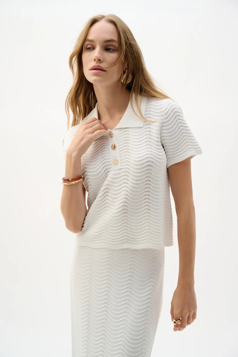 Woman wearing Joseph Ribkoff vanilla textured sweater knit short sleeve shirt, featuring a polo collar, button detail, soft knit fabric, and a relaxed elegant fit.