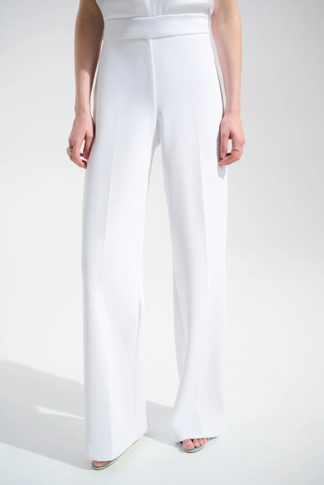 Woman wearing Joseph Ribkoff wide-leg pants for elegant office outfit