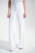 Woman wearing Joseph Ribkoff wide-leg pants for elegant office outfit