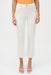 Woman wearing white straight leg ankle-length jeans from Joseph Ribkoff