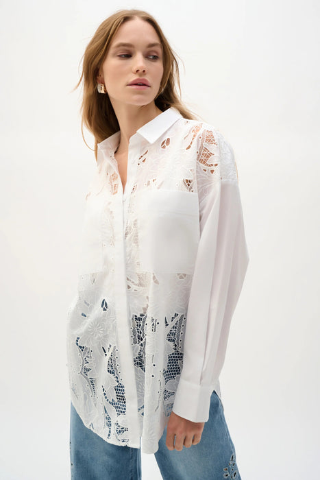 Woman wearing Joseph Ribkoff white lace embroidered blouse for elegant office outfit