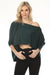 Woman wearing a dark green cropped high-low sweater top with 3/4 dolman sleeves from Kozan