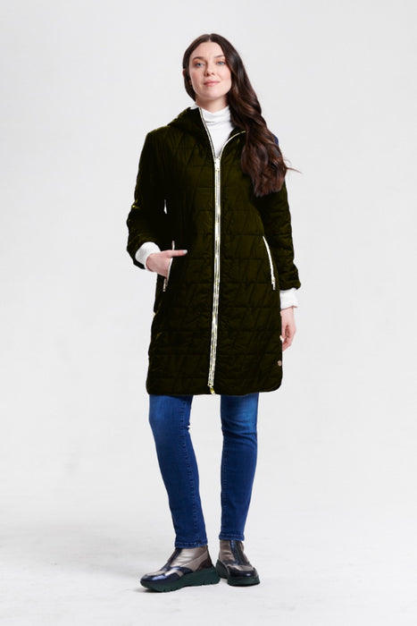 A woman modeling a black quilted hooded puffer coat with a silver zipper closure and zip pockets from Nikki Jones