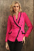 Woman wearing bright pink textured blazer with black frayed trim and flap pockets from OO LA LA
