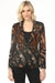Woman wearing a textured animal-printed blazer jacket from OO LA LA