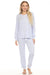 Woman wearing a blue matching loungewear top and pant with subtle stars pattern and striped rib cuffs