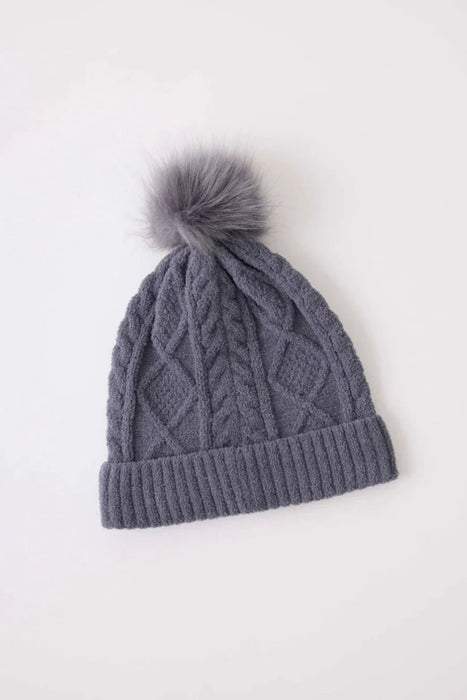 Gray knit beanie with a faux fur pom-pom on top