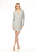 Woman wearing a striped button down  nightshirt with long sleeves from PJ Salvage