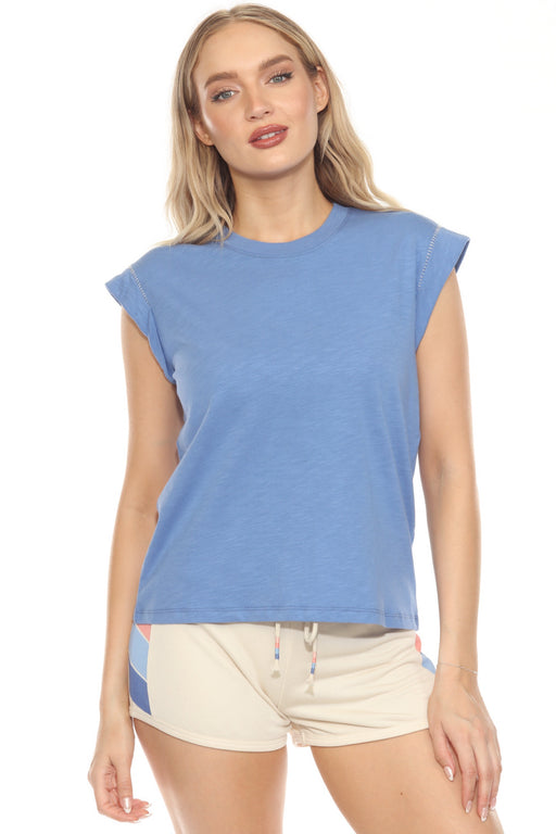 Woman wearing a blue lounge top with crew neck and short sleeves