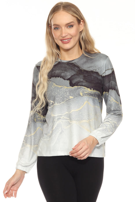 Woman wearing a long sleeve lounge top with marble pattern sublimation print