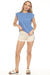 Woman wearing a blue top and beige shorts with drawstring and stripes on the sides