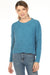 Woman wearing a blue sweater top with textured weave pattern and crew neck from Planet by Lauren G