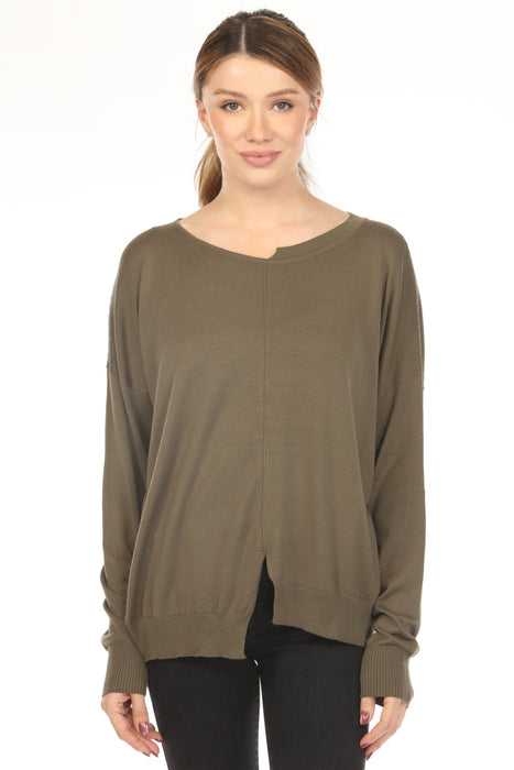 Woman wearing a green sweater top with cutout details and boat neck from Planet by Lauren G
