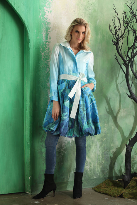 Women wearing Samuel Dong Aqua Seaweed print bubble coat dress with statement collar, self-tie belt, and bubble hem
