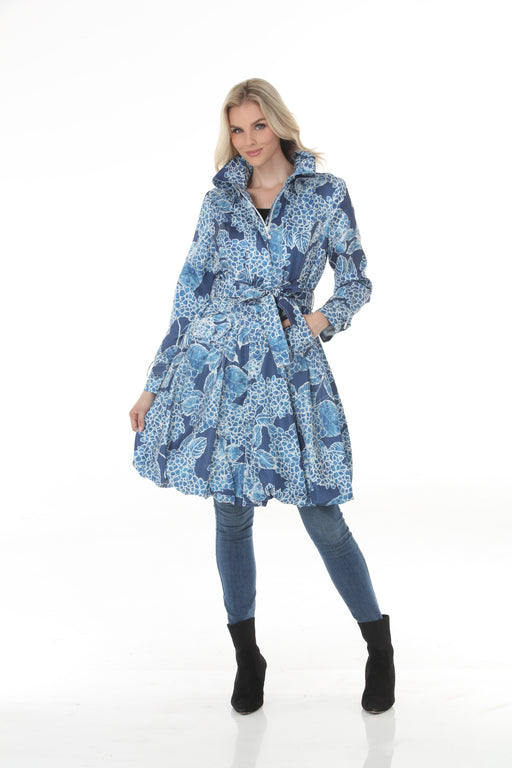Woman wearing Samuel Dong indigo floral print bubble coat dress with statement collar and belt