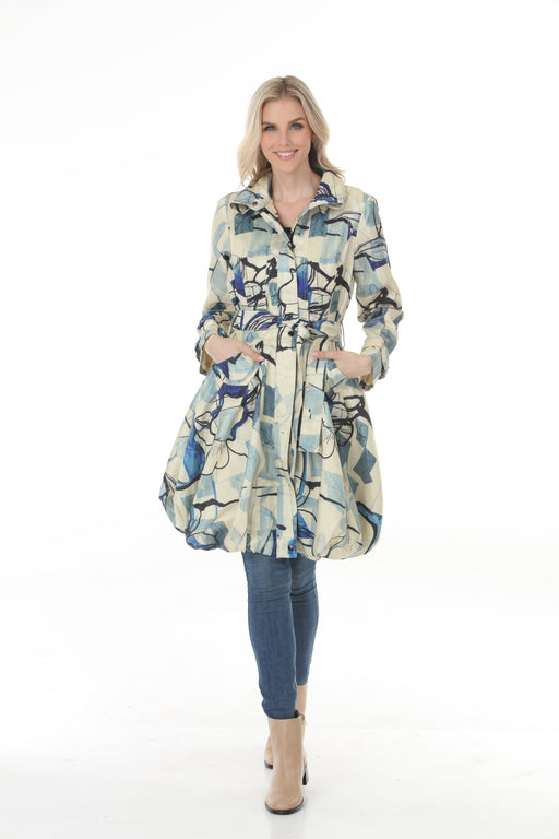 Woman wearing Samuel Dong Ivory Blue print bubble coat dress with statement collar, self-tie belt, and bubble hem
